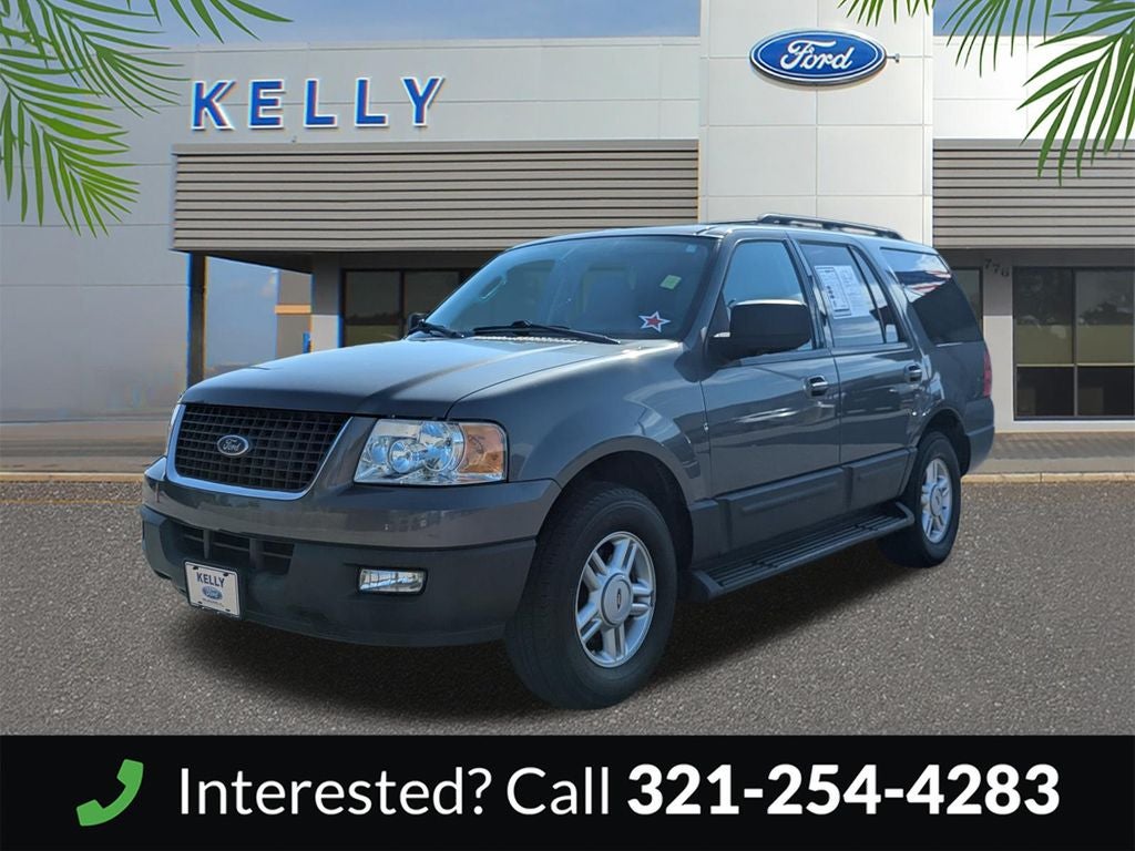 2005 Ford Expedition XLT in Dark Shadow Gray Clearcoat Metallic — front three-quarter view