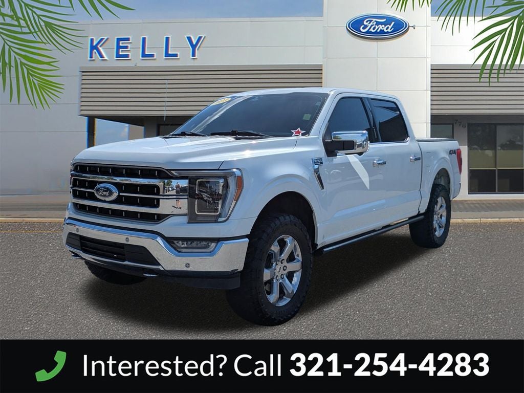 2023 Ford F-150 Lariat in White Metallic — front three-quarter view