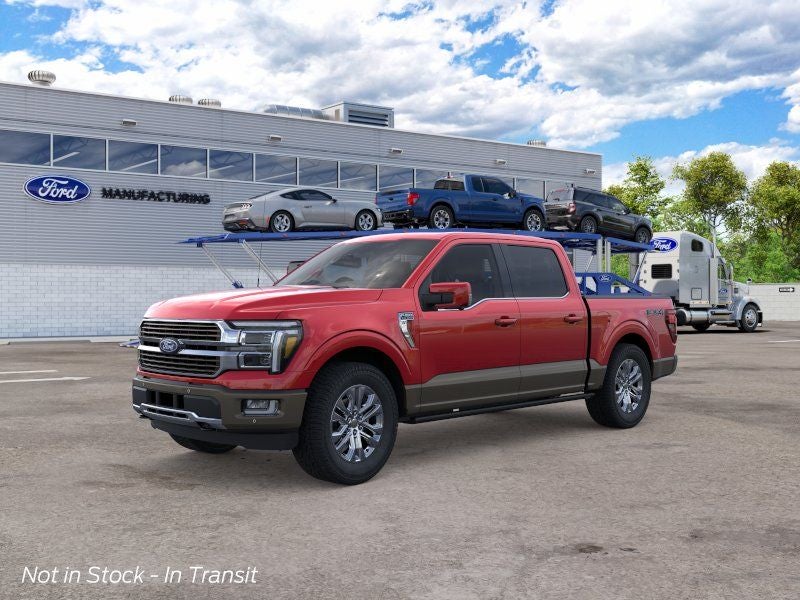 2026 Ford F-150 King Ranch in Ruby Red — front three-quarter view