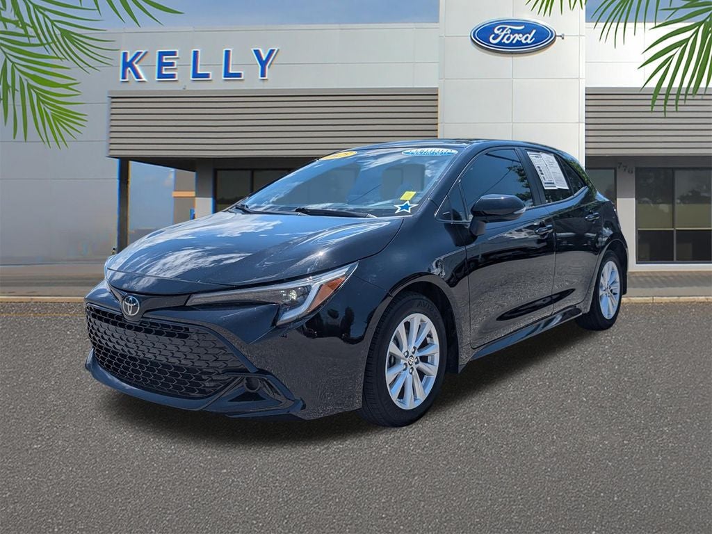 2025 Toyota Corolla Hatchback SE in Midnight Black Metallic — front three-quarter view