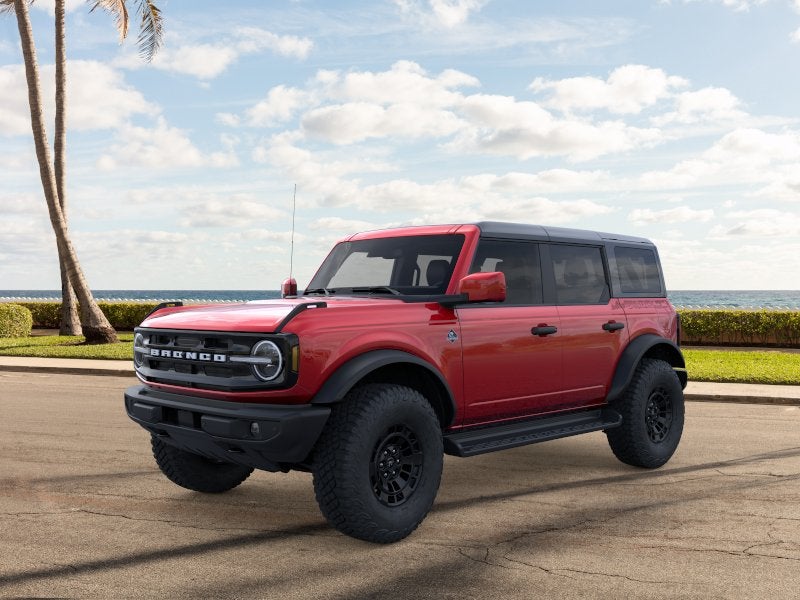 2026 Ford Bronco Outer Banks in Ruby Red Metallic Tinted Clearcoat — front three-quarter view